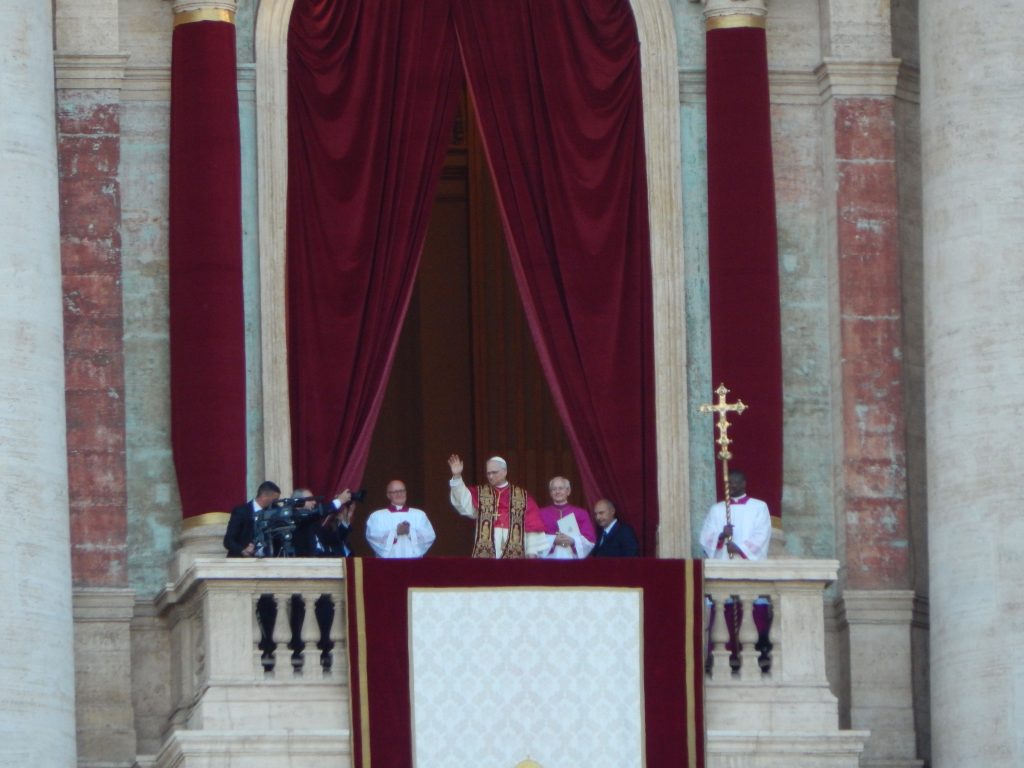 The pope waves to crowds gathered in St. Peter's Square u2014 file photo, May 2025.