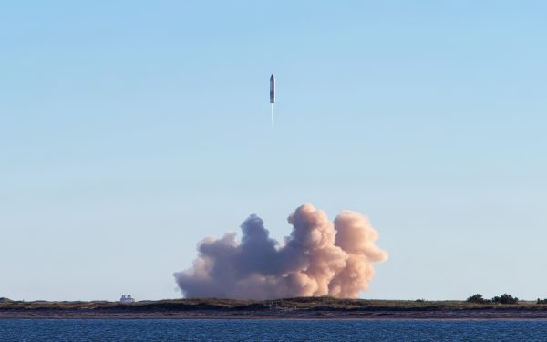 SpaceX's Starship lifting off; SpaceX stock has traded publicly since its June IPO.