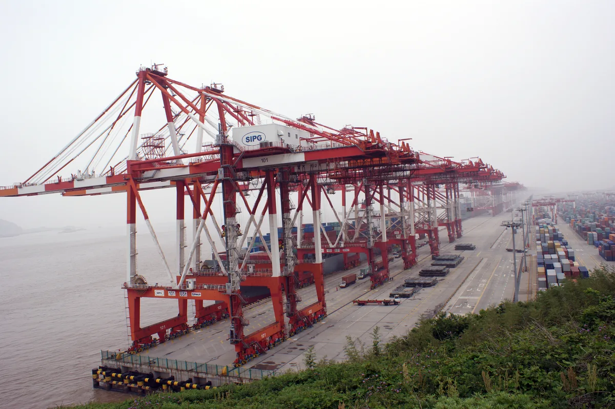 Stacked shipping containers at Yangshan port, Shanghai, China