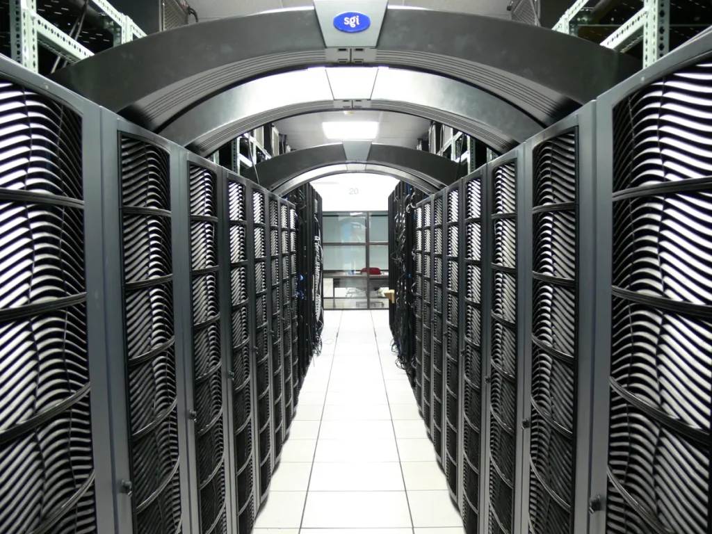 Server hall inside a data center like the Nscale Essex AI facility Microsoft abandoned in its anchor-tenant deal