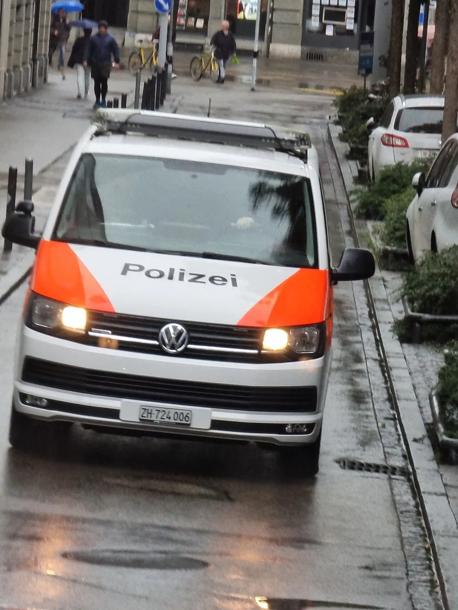 Swiss police car — officers launched a nationwide manhunt after the Aarau rave shooting