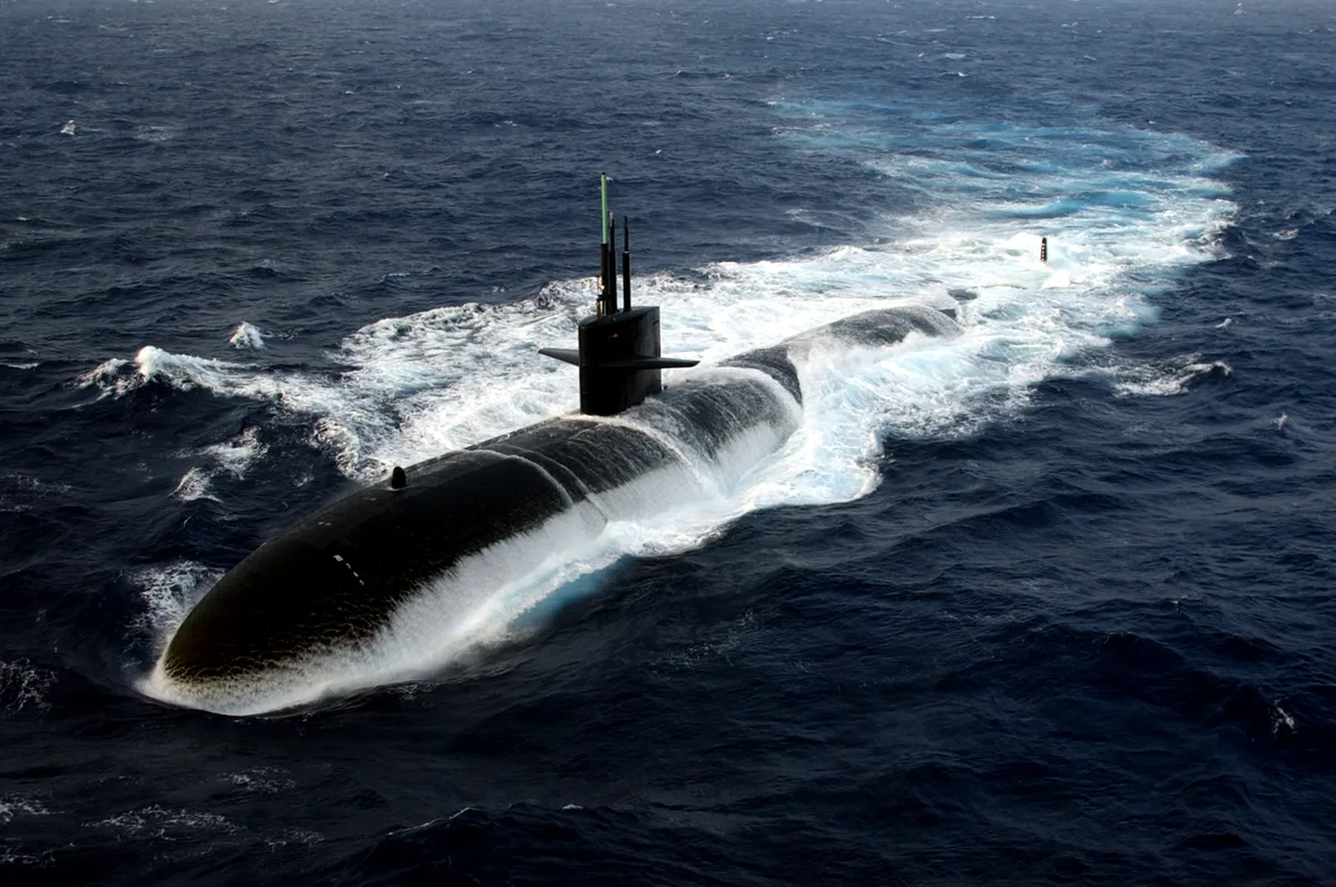 A submarine surfacing in the Atlantic Ocean during a 2004 exercise (illustrative photo)